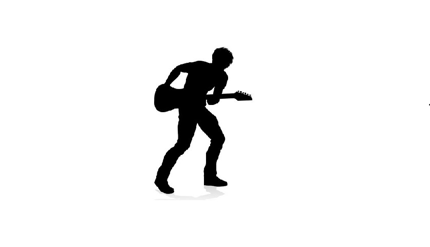 129174308-silhouette-de-guitariste-musicien